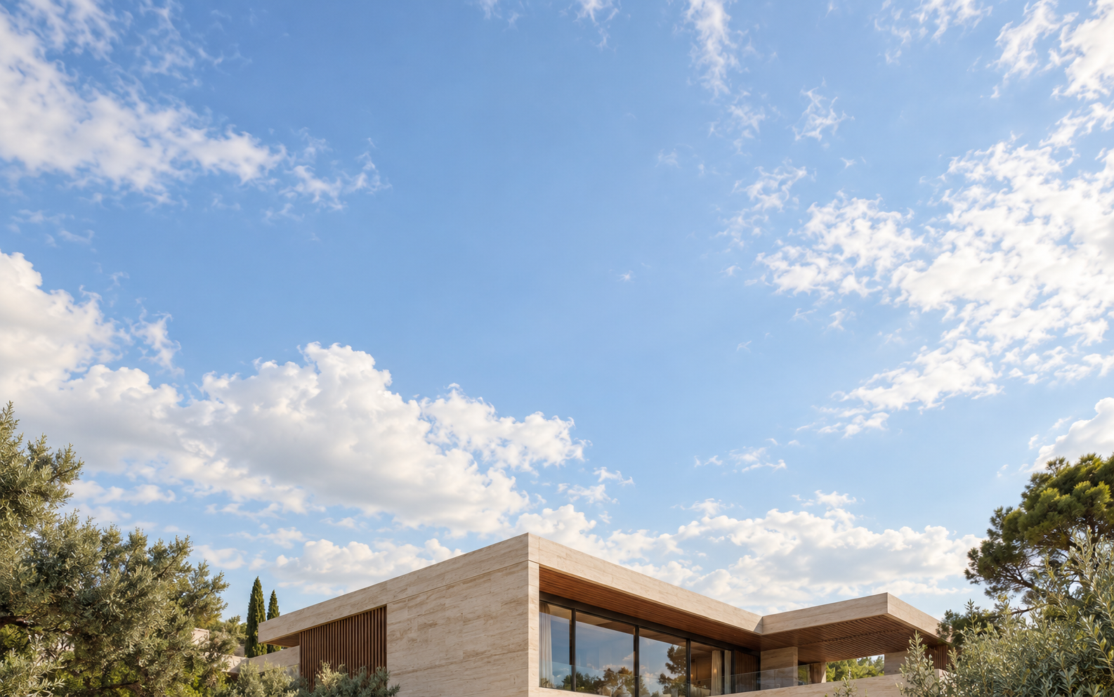 Illustrative modern limestone villa beneath an open sky